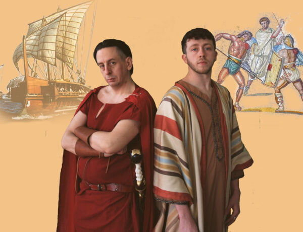 A roman and a peasant stand shoulder to shoulder.