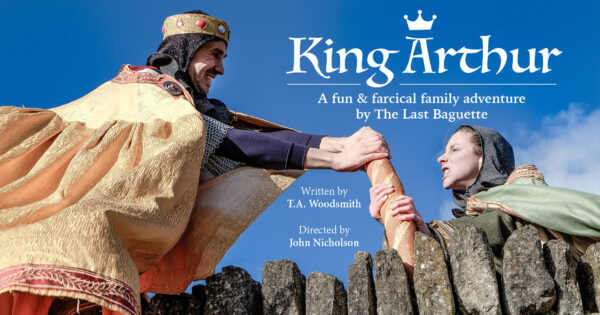 King Arthur atop a stone wall, attempts to steal a baguette from a peasant. Text reads: "King Arthur. A fun and farcical family adventure by The Last Baguette